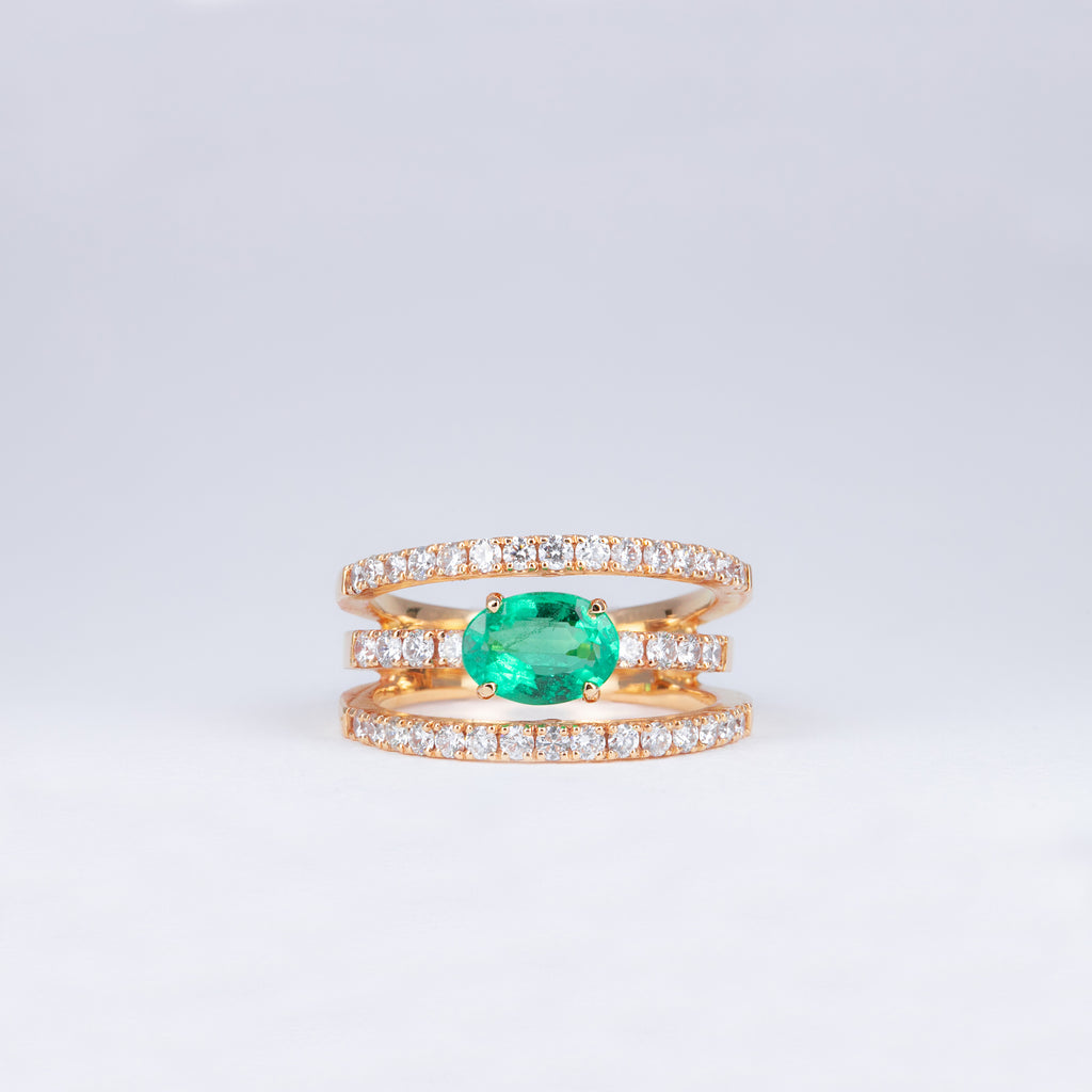Bague émeraude et diamants ajourée