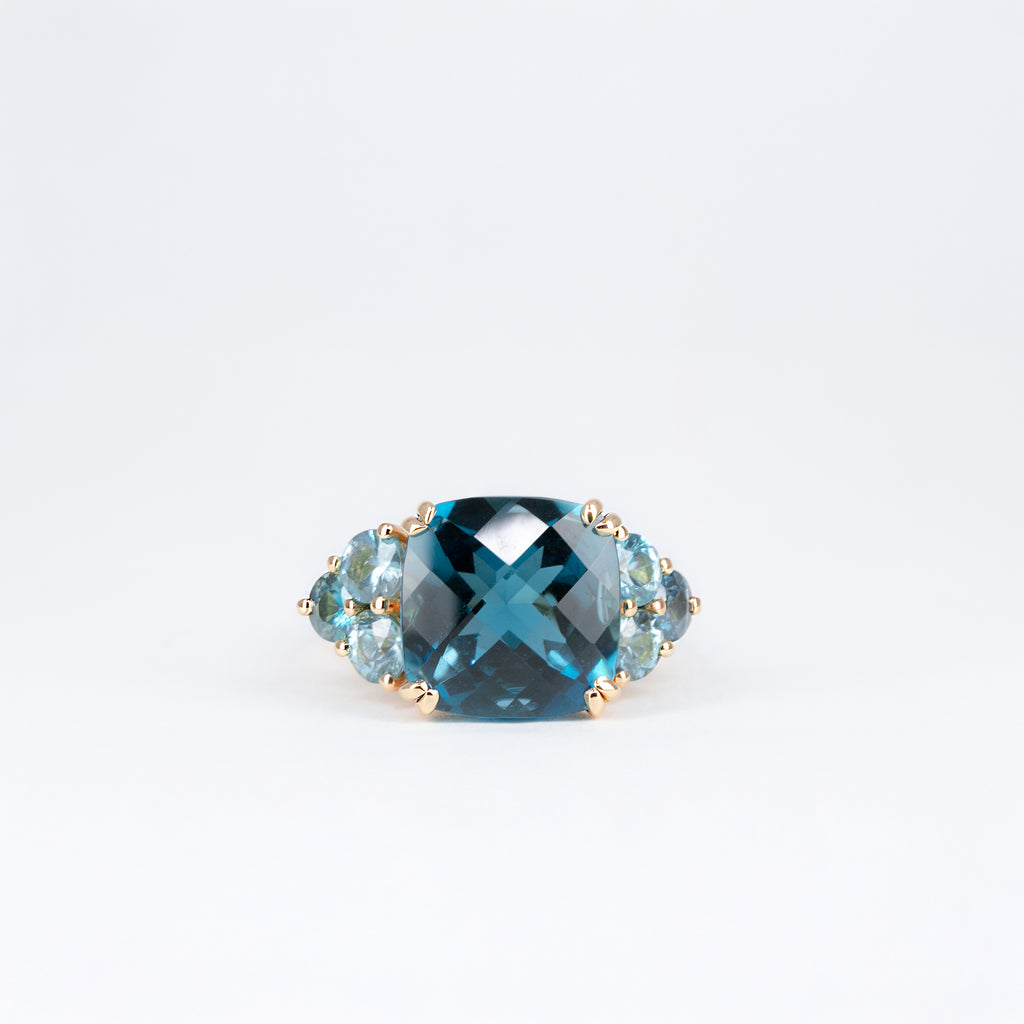 Bague Bleue coussin et zircons naturels
