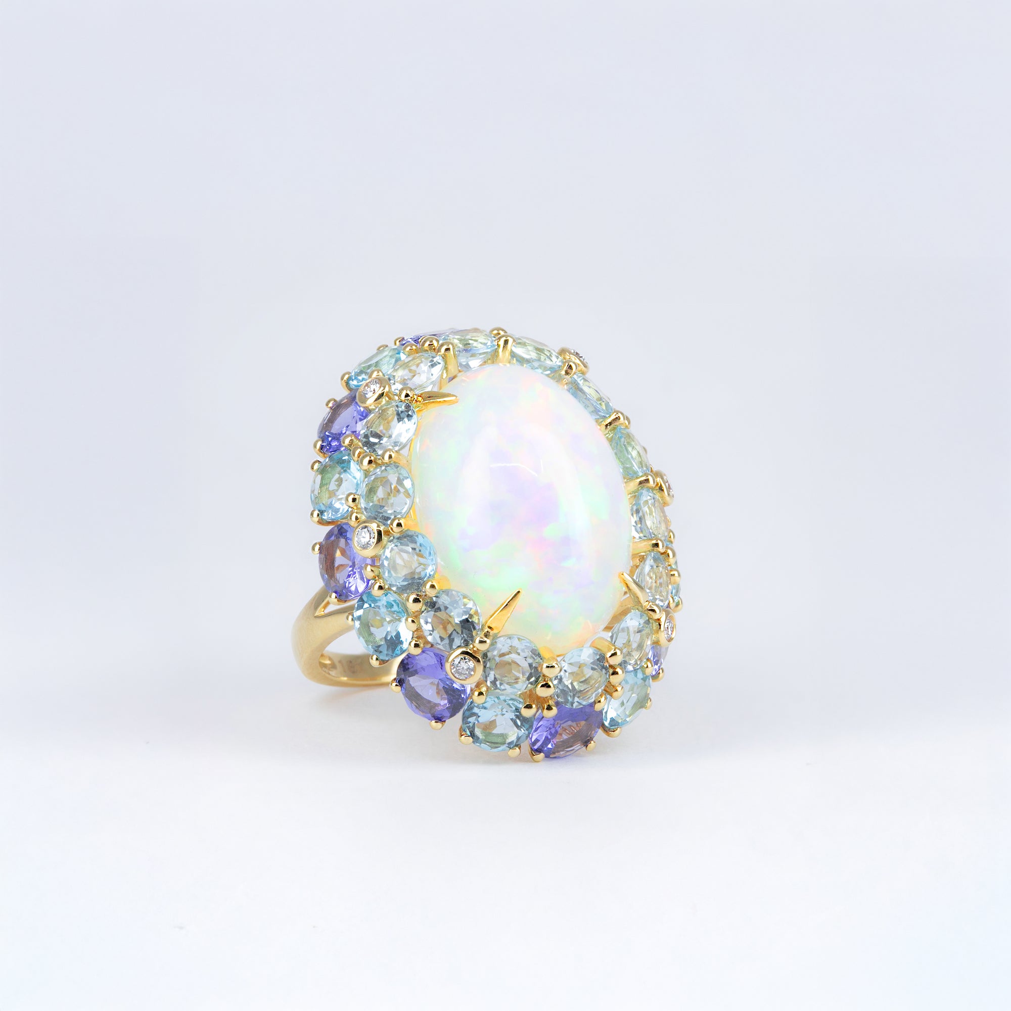 Bague opale tanzanites et topazes