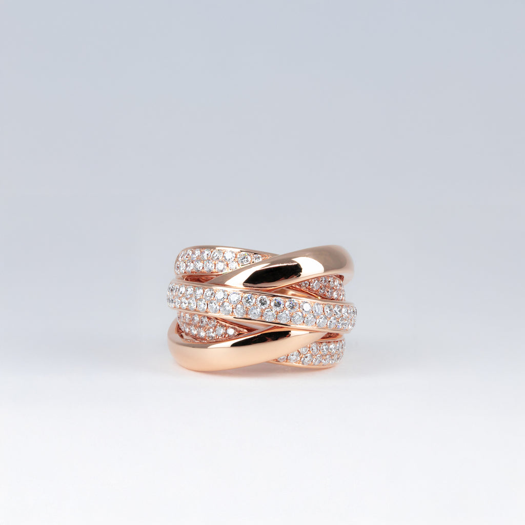 Bague or rose croisée et diamants