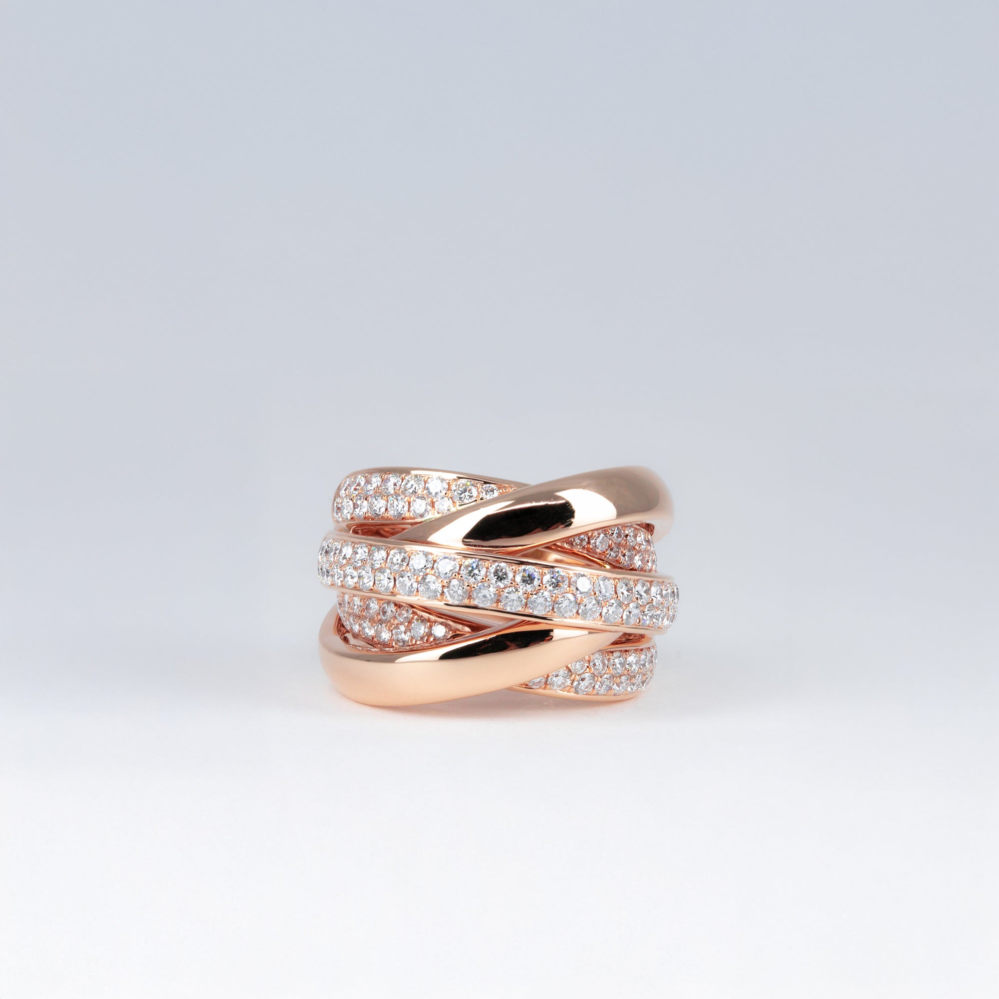 Bague or rose croisée et diamants