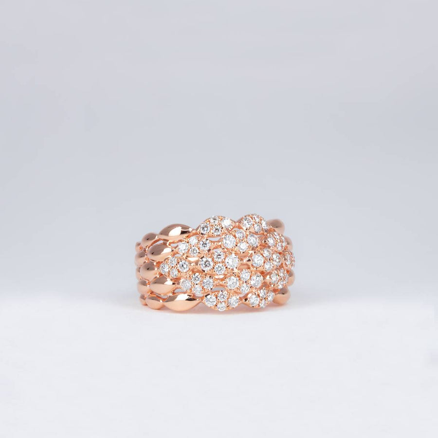 Bague or rose ondulés pavés de diamants
