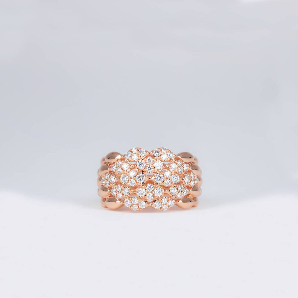Bague or rose ondulés pavés de diamants