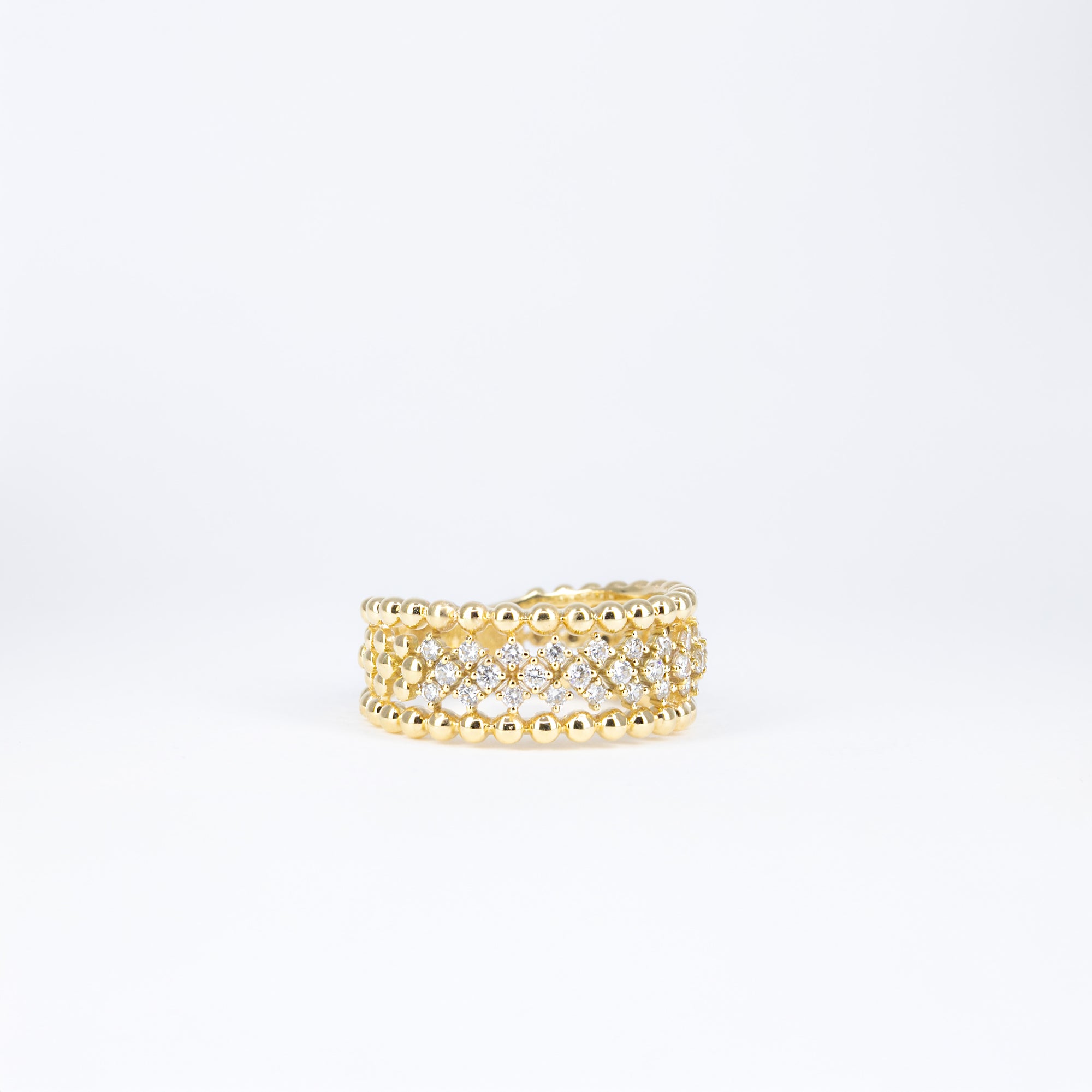 Bague ajourée en or jaune et diamants
