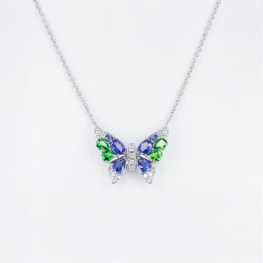 Pendentif Papillon tsavorites et saphirs bleus