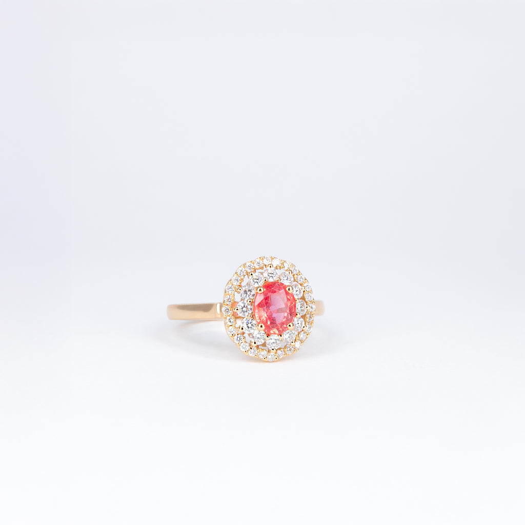 Bague en or rose 18K avec saphir orange padparadscha et double entourage de diamants