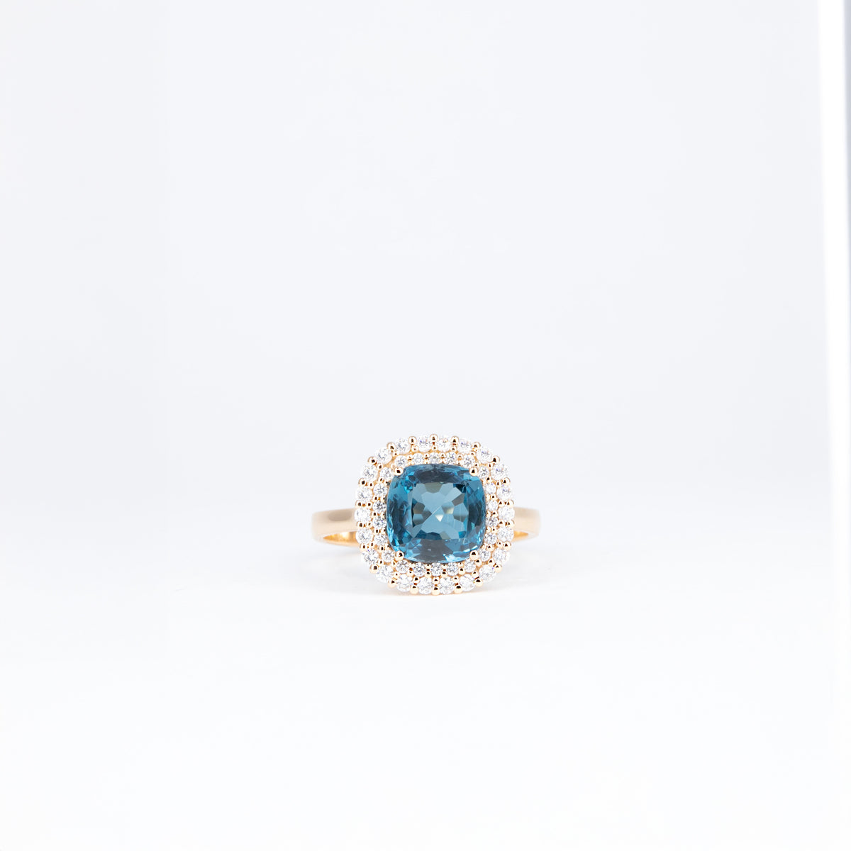 Bague modèle 67807 en or rose, topaze London Blue 1,60 ct et diamants taille brillant