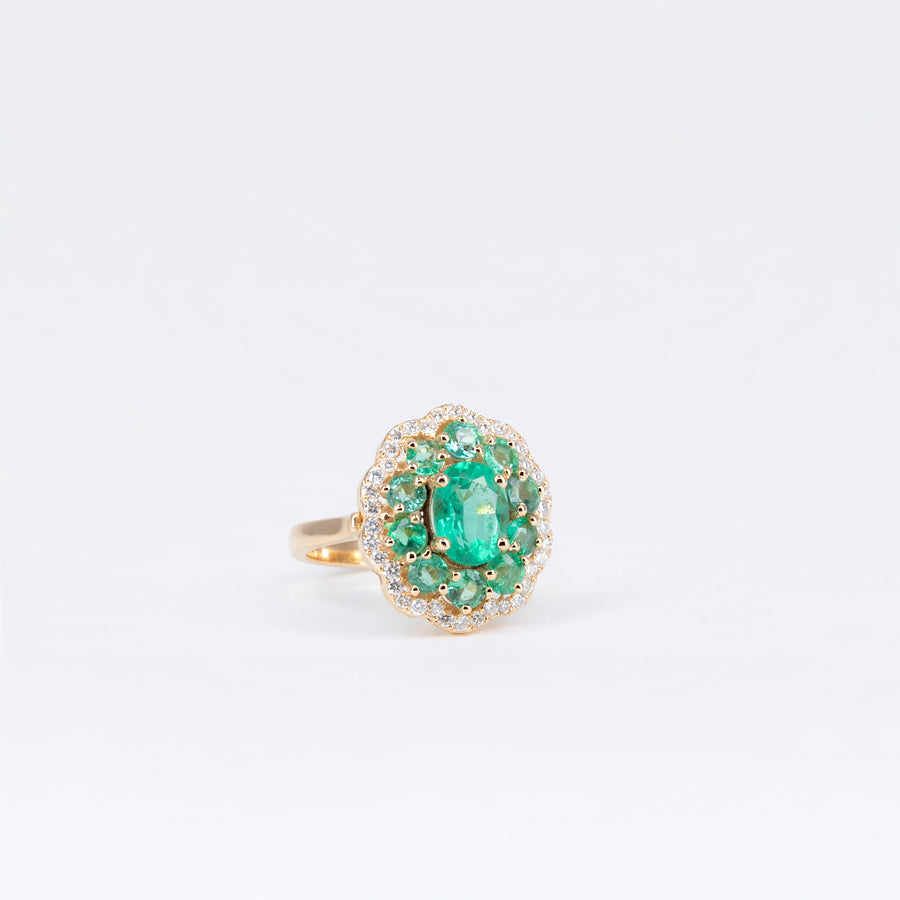 Bague or rose émeraudes et diamants
